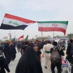 پایین کشیدن پرچم ایران در پیاده‌روی اربعین