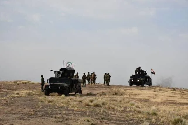 حشد شعبی علیه پایگاه مخفی آمریکا-اسرائیل در عراق عملیات آغاز کرد